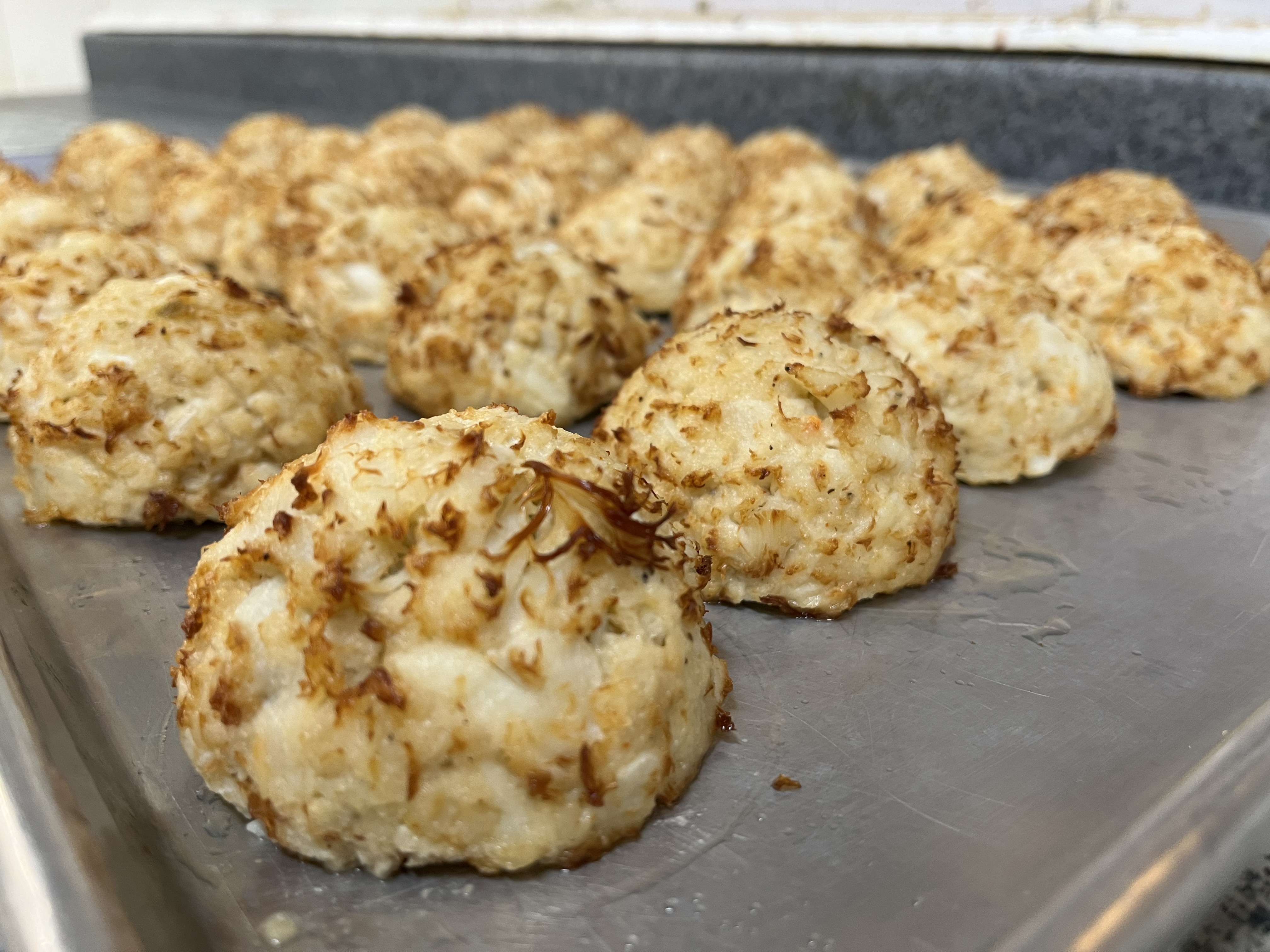 crabcakes on a tray